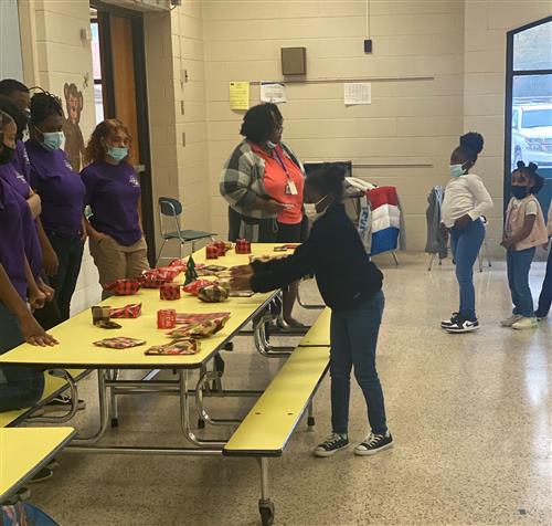Student 2 Student club donated toys to Primetime kids at Loyd Auman Elementary School